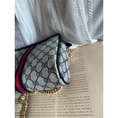 black clutch that looks like gucci|Gucci ophidia clutch.